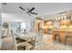 Open concept kitchen and dining area with modern appliances at 717 Carolina Ave, Tarpon Springs, FL 34689