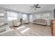 Living room with light beige sofas and hardwood floors at 717 Carolina Ave, Tarpon Springs, FL 34689