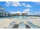 Resort-style pool with lounge chairs and clubhouse view at 732 Ocean Spray Dr, Ruskin, FL 33570