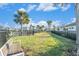 Fenced dog park with grassy area and bench at 732 Ocean Spray Dr, Ruskin, FL 33570