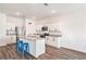 Modern kitchen featuring white cabinets, granite countertops, and a kitchen island at 732 Ocean Spray Dr, Ruskin, FL 33570