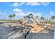 playground with play structures and equipment at 732 Ocean Spray Dr, Ruskin, FL 33570