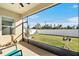 Relaxing screened patio overlooking backyard at 732 Ocean Spray Dr, Ruskin, FL 33570