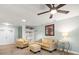 Living room boasting ample natural light and seating at 7436 Baltusrol Dr, New Port Richey, FL 34654