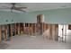 Under construction living room with exposed framing at 7623 Gulf Blvd, St Pete Beach, FL 33706