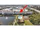 Community aerial view showing pool, tennis courts, and location at 8229 Eagles Park N Dr, St Petersburg, FL 33709