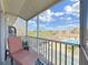 Relaxing balcony overlooking the community pool and tennis court at 8229 Eagles Park N Dr, St Petersburg, FL 33709