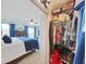 Large bedroom closet with ample shelving and hanging space at 8229 Eagles Park N Dr, St Petersburg, FL 33709