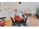 Bright dining room with a wooden table and six chairs at 8229 Eagles Park N Dr, St Petersburg, FL 33709