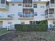 Building exterior showing multiple units with balconies at 8229 Eagles Park N Dr, St Petersburg, FL 33709