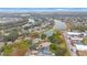 Aerial view of community with canal and homes at 8419 Quarter Horse Dr, Riverview, FL 33578