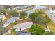 Aerial view of single Gathering home near canal at 8419 Quarter Horse Dr, Riverview, FL 33578