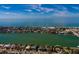 Aerial view of house near waterfront, showcasing beach and ocean views at 9320 Gulf Blvd, St Pete Beach, FL 33706