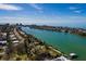 Aerial view of waterfront property with private dock at 9320 Gulf Blvd, St Pete Beach, FL 33706