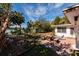 Waterfront backyard with patio and seating at 9320 Gulf Blvd, St Pete Beach, FL 33706