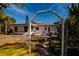 Backyard with patio and access to waterfront at 9320 Gulf Blvd, St Pete Beach, FL 33706