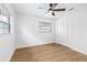 Spacious bedroom with wood floors and ceiling fan at 11119 N 21St St, Tampa, FL 33612