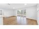 Light-filled living room featuring sliding glass doors at 11119 N 21St St, Tampa, FL 33612