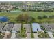 Aerial view showcasing a home's location in a golf course community at 1123 Emerald Dunes Dr, Sun City Center, FL 33573