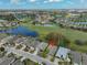 Aerial view of the home and surrounding neighborhood at 1123 Emerald Dunes Dr, Sun City Center, FL 33573