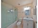 Clean bathroom with a tub, shower, and vanity at 1123 Emerald Dunes Dr, Sun City Center, FL 33573