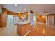 Kitchen boasting light-colored cabinetry, white appliances, and a breakfast bar at 1123 Emerald Dunes Dr, Sun City Center, FL 33573