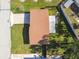 Aerial view showing house, driveway, and surrounding yard at 11388 77Th Ave, Seminole, FL 33772