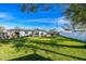 Large backyard with house and fence views at 11388 77Th Ave, Seminole, FL 33772