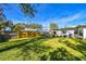 Large backyard with house and fence views at 11388 77Th Ave, Seminole, FL 33772