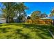 Large backyard with shed and wooden fence at 11388 77Th Ave, Seminole, FL 33772