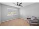 Bright bedroom with neutral walls and carpeted floor at 12717 Carte Dr, Tampa, FL 33618