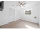 Bright bedroom with double closets and ceiling fan at 12717 Carte Dr, Tampa, FL 33618