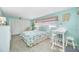 Bright bedroom with a queen bed and built-in closet at 14042 Starboard Dr, Seminole, FL 33776