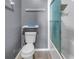 Clean bathroom with white toilet and shower/tub combo at 1410 Prescott S St, St Petersburg, FL 33712