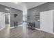 Inviting entryway with wood-look floors and a view into the living area at 1410 Prescott S St, St Petersburg, FL 33712