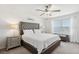 Main bedroom with tufted headboard and plenty of light at 14341 Editors Note St, Ruskin, FL 33573