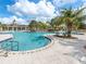 Relaxing freeform pool with multiple seating areas at 14341 Editors Note St, Ruskin, FL 33573