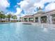 Resort-style pool with covered seating and fountains at 14341 Editors Note St, Ruskin, FL 33573