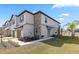 Two story house with stone accents and landscaped yard at 14341 Editors Note St, Ruskin, FL 33573