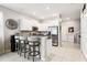 Modern kitchen with stainless steel appliances and an island at 14341 Editors Note St, Ruskin, FL 33573