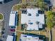 Aerial view showing building layout, parking, and landscaping at 14525 Catalina Cir, Seminole, FL 33776