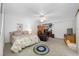 Spacious bedroom with a king-size bed and workspace at 14525 Catalina Cir, Seminole, FL 33776