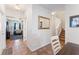 Bright entryway with tiled floors and view of the living room at 14935 Skip Jack Loop # 106, Lakewood Ranch, FL 34202