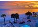 Aerial view of condo complex, pool, beach at sunset at 16330 Gulf Blvd # 306, Redington Beach, FL 33708