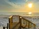 Private beach access steps to the shore at 16330 Gulf Blvd # 306, Redington Beach, FL 33708