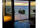 Ocean view from living room with sliding glass doors to balcony at 16330 Gulf Blvd # 306, Redington Beach, FL 33708