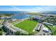 Aerial view of a stadium with green field and seating at 1690 74Th N Ave, St Petersburg, FL 33702