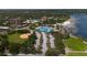 Aerial view of a park with pool, beach and parking at 1690 74Th N Ave, St Petersburg, FL 33702