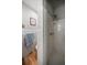 Simple shower stall with white tile and a tiled floor at 1690 74Th N Ave, St Petersburg, FL 33702