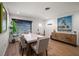 Bright dining room featuring a contemporary table and stylish decor at 1690 74Th N Ave, St Petersburg, FL 33702